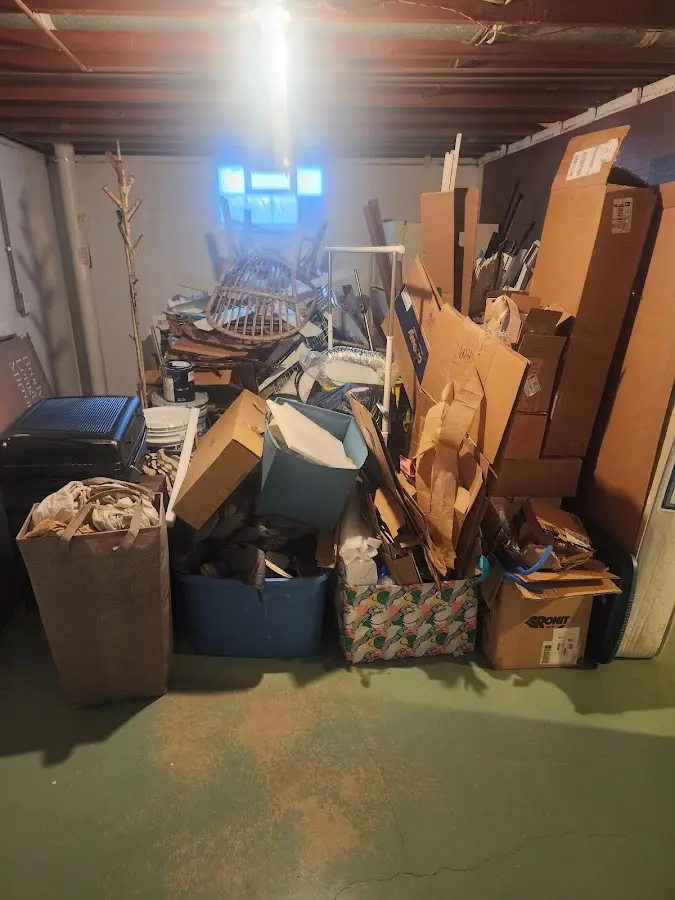 Roll-off dumpster container at job site for 2 Yard Dumpster Rental in Pleasant Hill